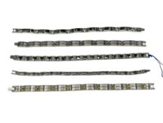 FIVE MEN'S STAINLESS STEEL LINKS BRACELETS FEATURING VARIOUS DESIGNS