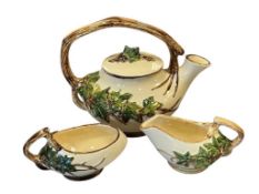 VINTAGE MCCOY POTTERY IVY TEAPOT WITH MATCHING CREAMER AND SUGAR CIRCA 1940'S