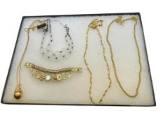 ANNE KLEIN GOLD TONE DESIGNER JEWELRY FEATURING CHARM BRACELET AND FOUR NECKLACES