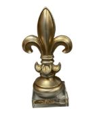 FLEUR DE LIS GOLD TONE RESIN DECORATION ON THICK ACRYLIC BASE