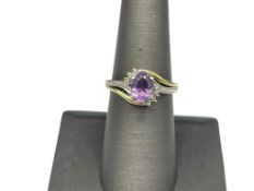 STERLING SILVER AND 10K YELLOW GOLD AMETHYST FASHION RING