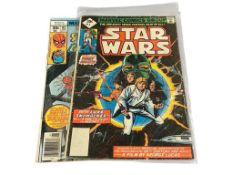 1977 SPIDER-MAN AN CAPTAIN BRITAIN NO. 65 AND 1977 STARWARS NO. 1 MARVEL COMIC BOOKS