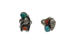 TWO VINTAGE NAVAJO STERLING SILVER TURQUOISE AND CORAL RINGS BOTH FEATURING FIGURAL FEATHER ACCENTS