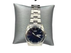 MEN'S CITIZEN QUARTZ WRISTWATCH FEATURING DAY AND DATE ADJUST