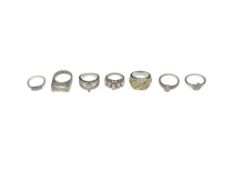 SIX STERLING SILVER FASHION RINGS AND A SILVERPLATED MARQUISE CZ RING