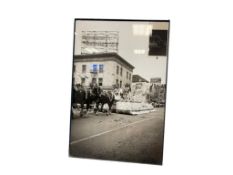 1930'S / 1940'S RENO RODEO PARADE DOWNTOWN RENO WITH NATIVE AMERICAN FLOAT NEAR HAROLD'S CLUB CAS...