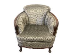 20TH CENTURY CARVED WOOD BARREL CHAIR WITH GRAY PATTEREND UPHOLSTERY