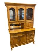 HONEY FINISH OAK TWO-PIECE CHINA CABINET WITH MIRRORED BACK