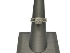 10K WHITE GOLD DIAMOND ENGAGEMENT SET FEATURING A CLUSTER OF DIAMONDS