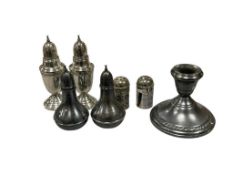 ANTIQUE STERLING SILVER TABLEWARE INCLUDING THREE SETS OF SALT AND PEPPERS SHAKERS AND CANDLESTICK
