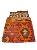 THREE VINTAGE TURKISH KILIM RUG PILLOW COVERS FEATURING GEOMETRIC PATTERNS AND VIBRANT COLORS