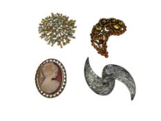 FOUR COSTUME JEWELRY BROOCHES INCLUDING A CAMEO DESIGN AND BRIGHT RHINESTONE DESIGNS