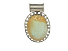 STERLING SILVER BALI TURQUOISE PENDANT FEATURING PIERCED BORDER AROUND STONE