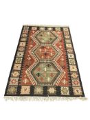 VINTAGE TURKISH ANATOLIAN RUG FEATURING GEOMETRIC PATTERNS