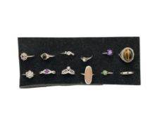 12 STERLING SILVER STONE RINGS INCLUDING TIGER'S EYE, AMETHYST, OPAL, AND MORE