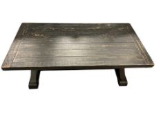 BLACK DISTRESSED WOOD AND METAL COCKTAIL TABLE