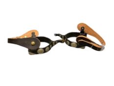 SHOWMAN BLACK STEEL SPURS WITH ENGRAVED CONCHOS AND BRASS ROWELS