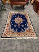 INDIGO BLUE AND FLORAL PATTERN ASIAN WOOL PILE AREA RUG