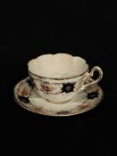 English Porcelain Teacup and Saucer with Gilt