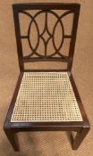 A Chippendale-Style Anglo-Indian Side Chair with Geometric Fretwork and Cane Seat