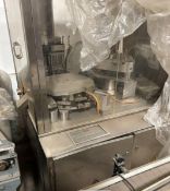 AUTOMATIC ENCAPSULATION MACHINE