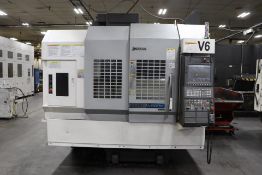 2019 OKUMA GENOS M560-V CNC VERTICAL MACHINING CENTER