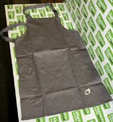 Approximately 1000x grey fire retardant aprons