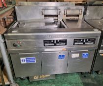 Frymaster stainless steel twin tank quad basket electric fryer with dump station