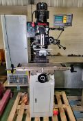 Bench drilling and milling machine mounted on a tool cabinet with spares and accessories