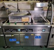 Frymaster FMRE217CSD (SN: 1504NI0016) 3 door stainless steel twin tank quad basket electric fryer