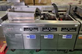 Frymaster RE17 (SN: 1003NJ0015) 4 door stainless steel triple tank electric fryer with dump station