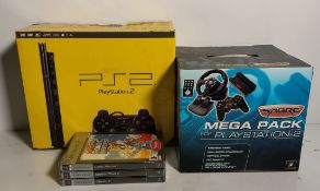 Sony PlayStation 2 slim gaming console with Mad Catz Sabre mega pack and 3 games