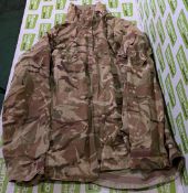 Various types of ex-military camo clothing - may include accessories - 169kg – may require repair