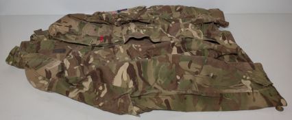 Various types of ex-military camo clothing - may include accessories - 151kg – may require repair