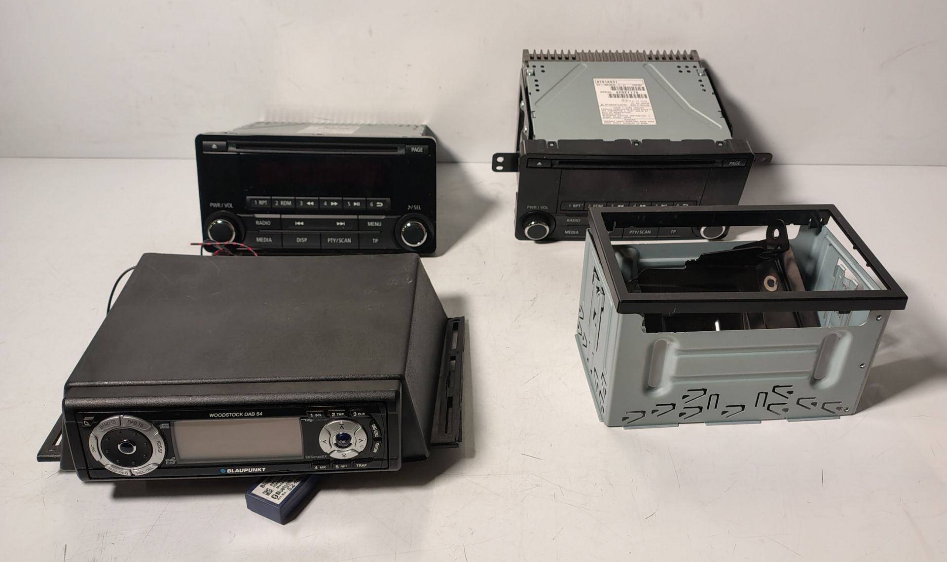 3x car stereos - 2x Mitsubishi head units and 1x Blaupunkt head unit