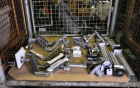Collection of adjustable mounting arms, extension poles, wall and desk mounting plates and more