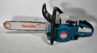 Makita DCS5000 50cc petrol chainsaw with accessories and carry case - L 810 x W 460 x H 330mm