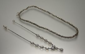 A silver pendant necklace set twelve oval moonstones with s link fastening: l. x 25cm and a white