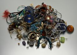 A large collection of costume jewellery to include bracelets, pendant and bead necklaces, Chinese