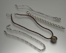 A silver circualr polished and patinated link bracelet with lobster claw fastening: d. x 7cm and