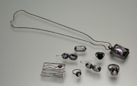 A collection of silver and white metal jewellery to include a silver faceted pink stone set ring U/