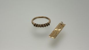 A 9ct gold ring set seven brilliant cut diamonds each stone approximately 0.02ct M 1.95g and a