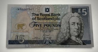 A Royal Bank of Scotland 2005 £5 Jack Nicklaus note, slight crease but appears to be uncirculated