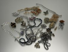 A collection of Vintage costume jewellery to include a gilt metal articulated Cartier-style paste