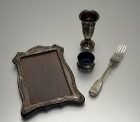 A collection of silver to include a Birnungham silver shaped photograph frame: interior h. x 13.