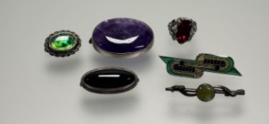 An oval white metal handmade amethyst oval brooch: l. x 4cm, a white metal Art Deco-inspired