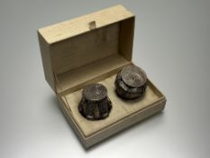 Two Taiwanese silver pierced circular engraved rope-bound presentation containers in original slub