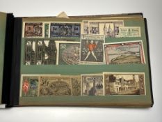 A rare 1920s folder containing an extensive collection of 531 vintage German bank notes with