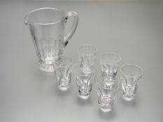 A Waterford Crystal Sheila pattern set of six water tumblers (h-9.5cm) and pitcher (h-19cm). (marked