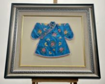 A Chinese 20thc Children's silk embroidered blue robe, with hand-stitched chrysanthemums and